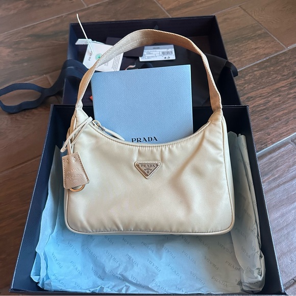 Prada Handbags - Re-Nylon Prada Re-Edition 2000 mini bag Cream Shoulder Bag with Signature Logo